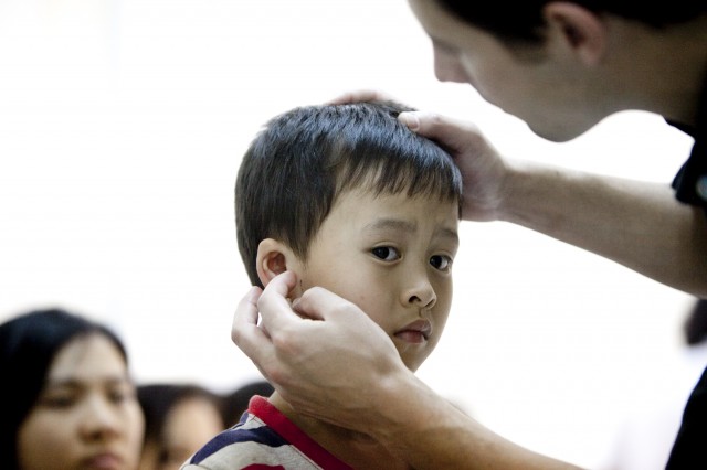 REI Volunteer with Patient